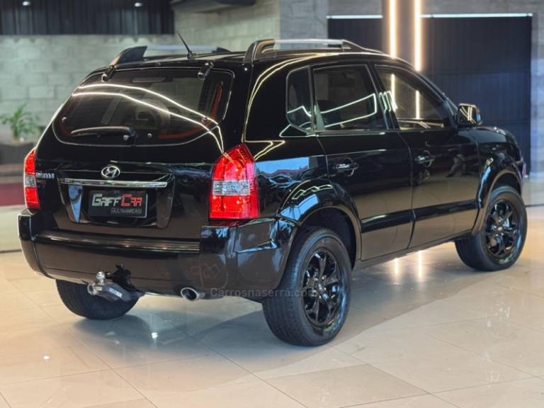 HYUNDAI - TUCSON - 2009/2010 - Preta - R$ 36.900,00