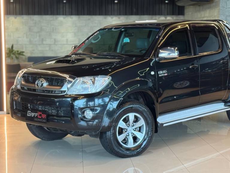 TOYOTA - HILUX - 2009/2010 - Preta - R$ 119.900,00