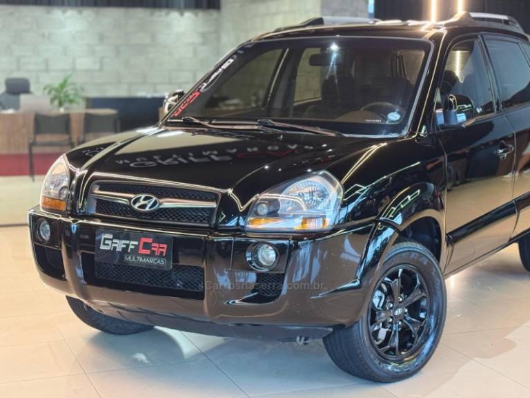 HYUNDAI - TUCSON - 2009/2010 - Preta - R$ 36.900,00