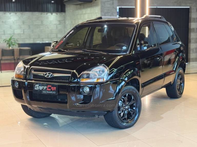 HYUNDAI - TUCSON - 2009/2010 - Preta - R$ 36.900,00