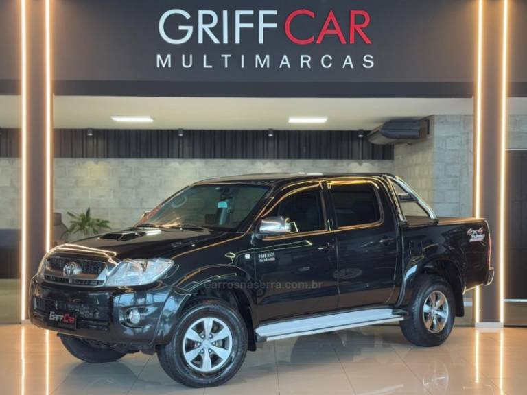 TOYOTA - HILUX - 2009/2010 - Preta - R$ 119.900,00