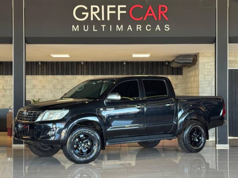 TOYOTA - HILUX - 2011/2012 - Preta - R$ 89.900,00